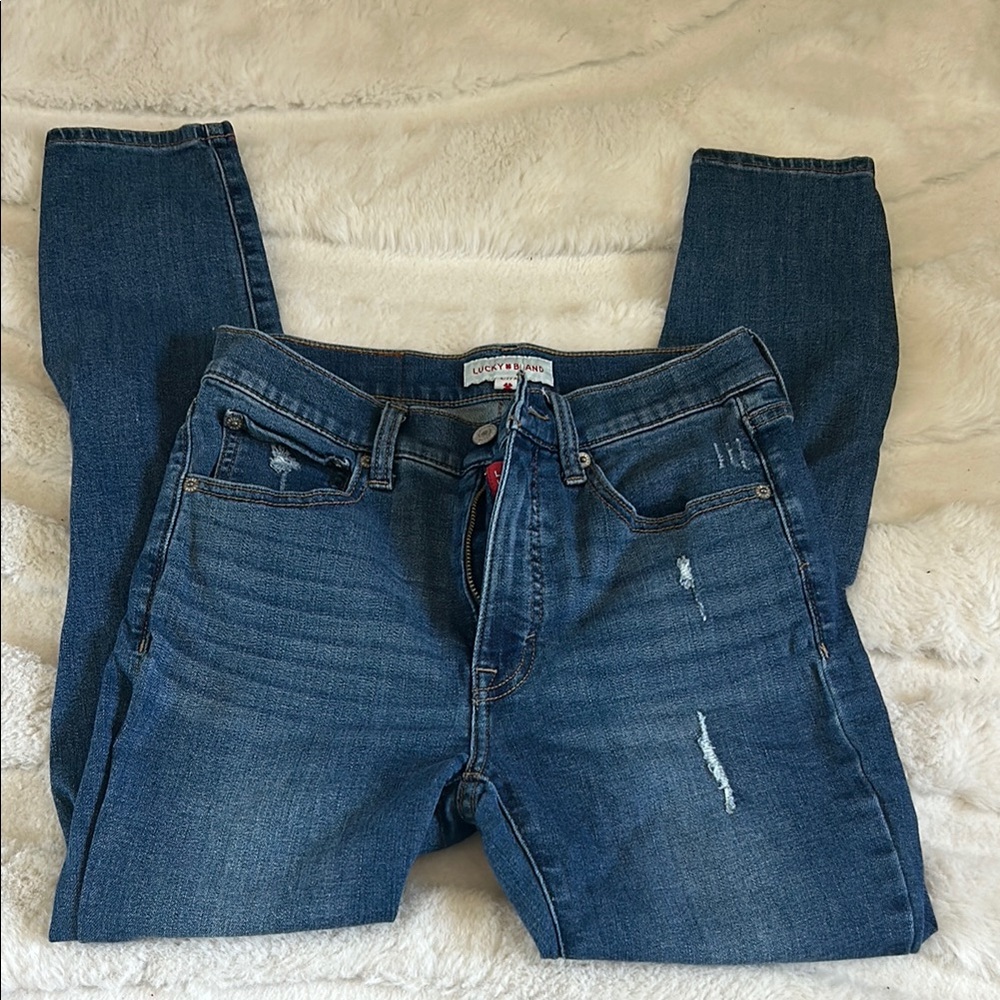 Lucky Brand Blue Skinny Jeans with Stretch and Distressed Details